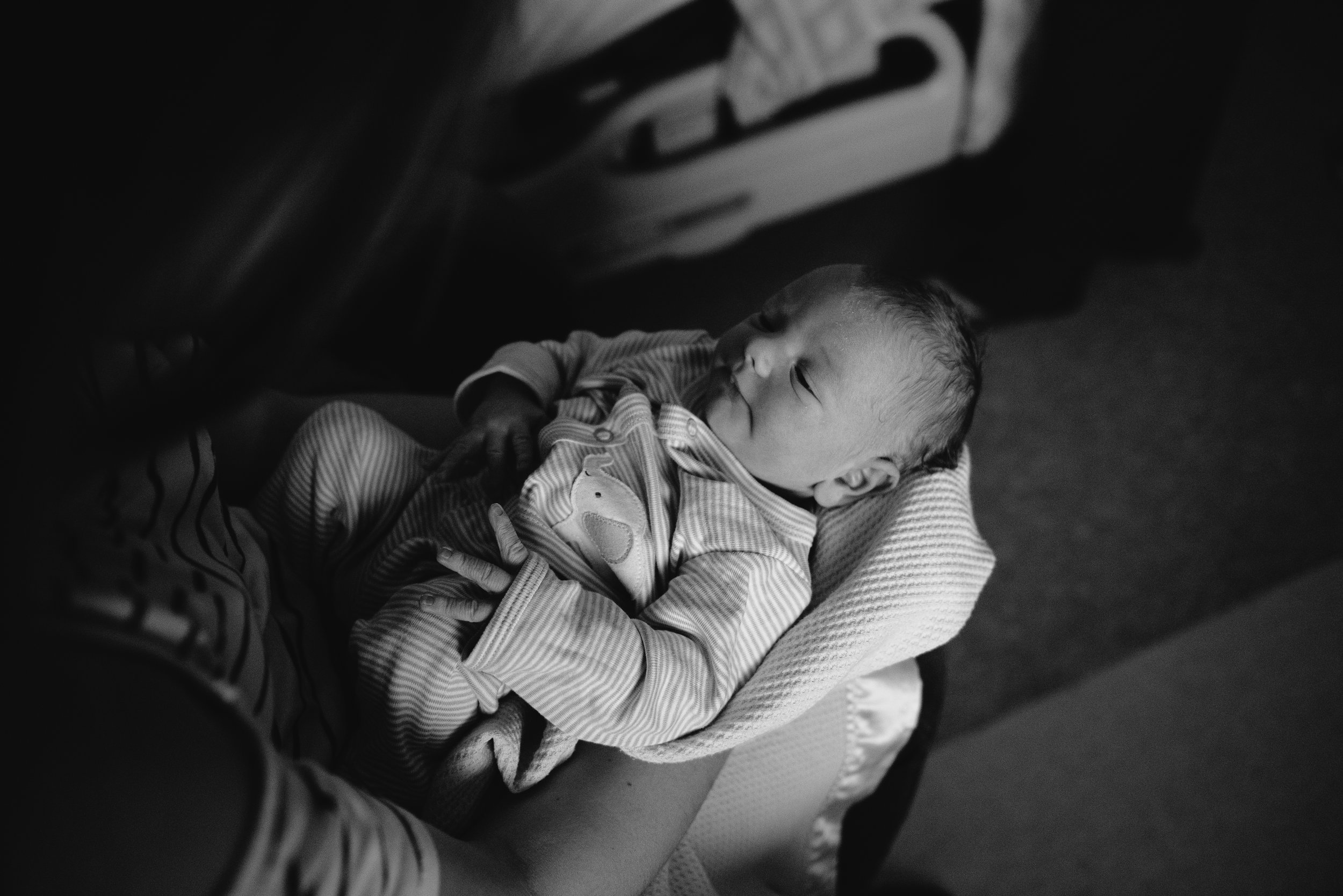 newborn in lap-newborn-pensacola photographer