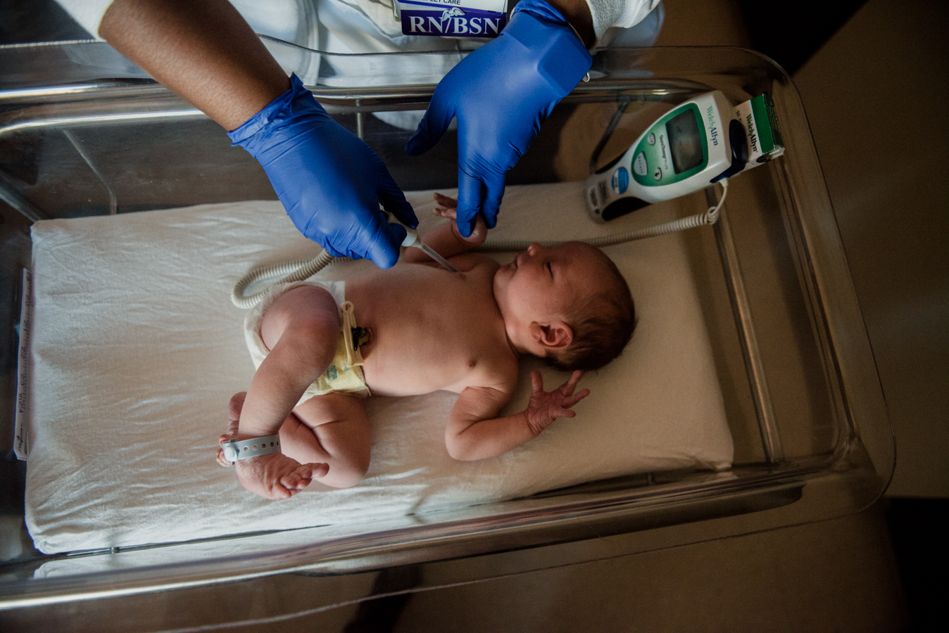 newborn with nurse-pensacola newborn photographer