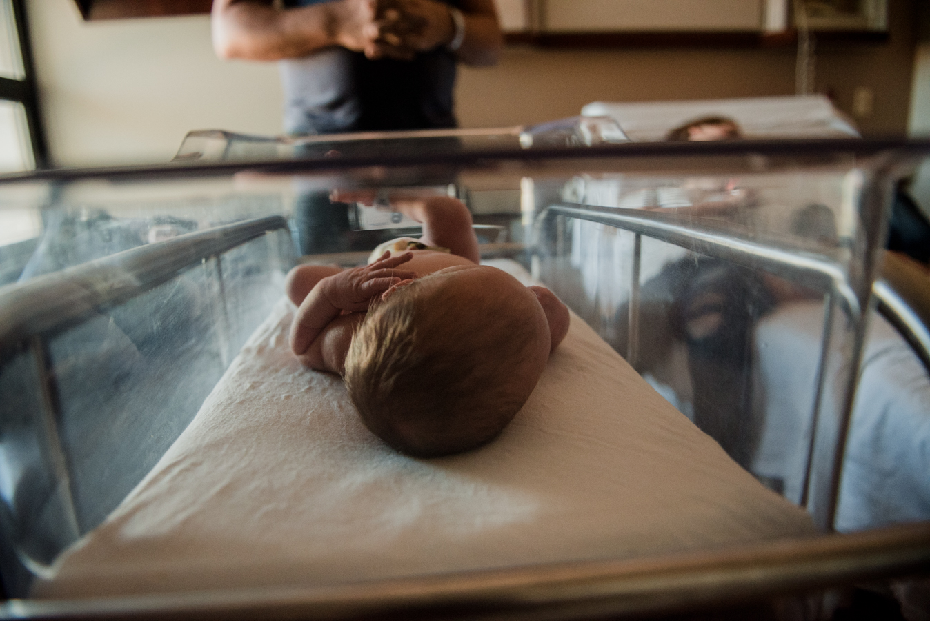 baby in hospital crib- pensacola child photographer