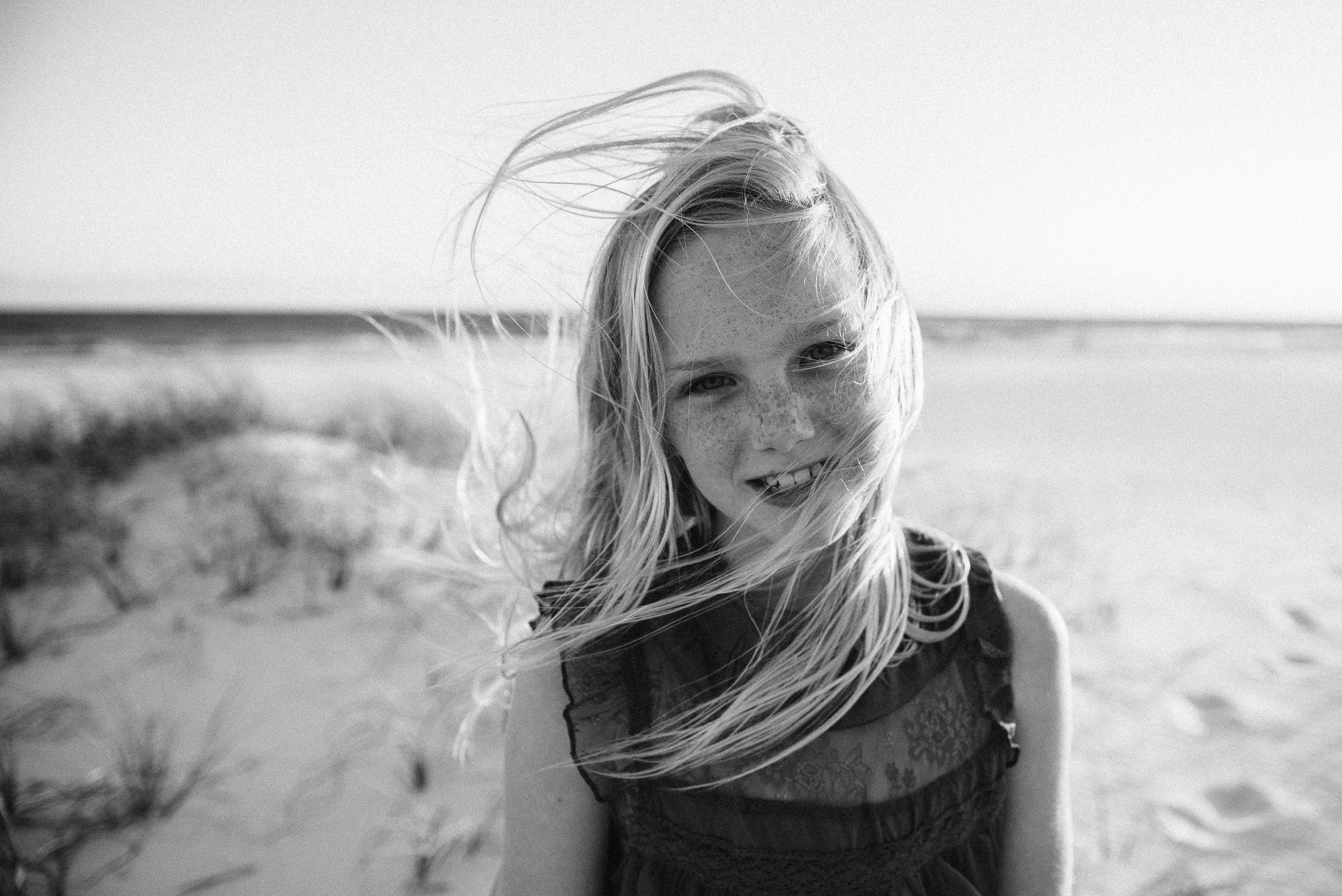 black and white photo of girl-pensacola beach child photographer