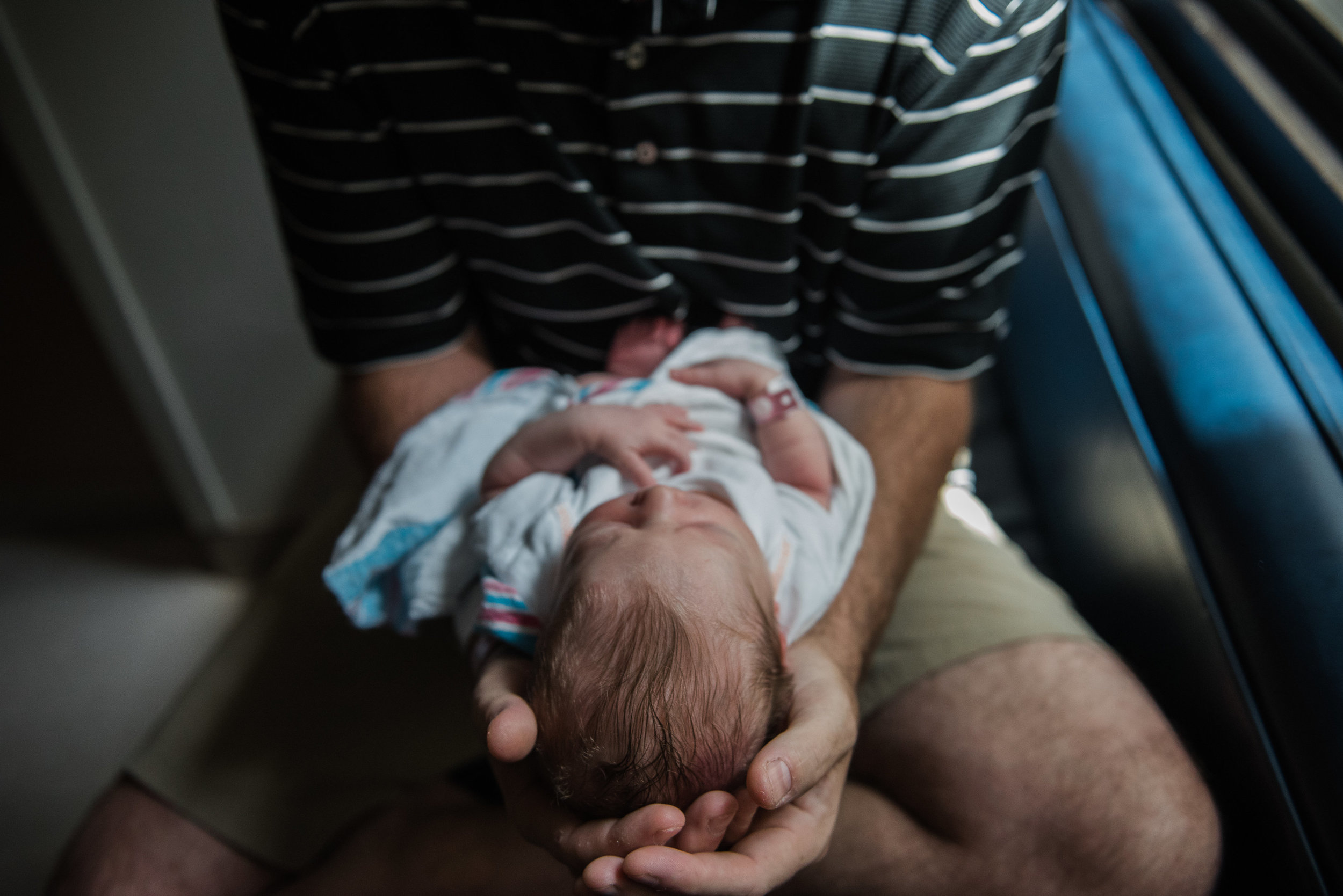 baby facing out-newborn pensacola photographer