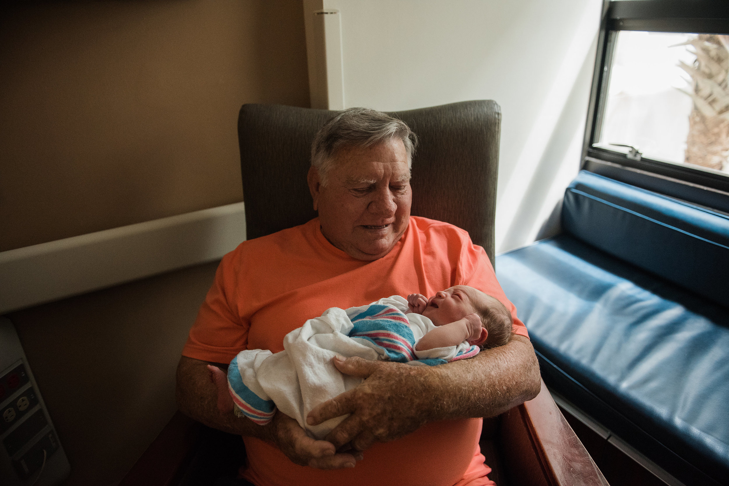 grandpa with baby-gulf breeze newborn photographer