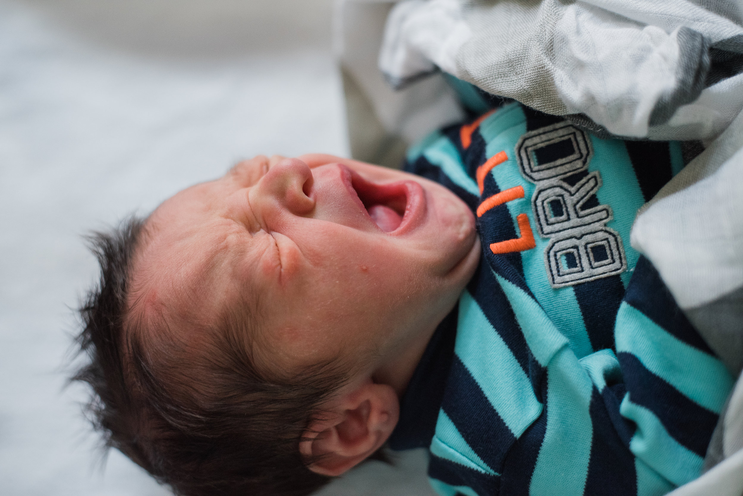 baby yawning-Gulf Breeze Newborn Photographer