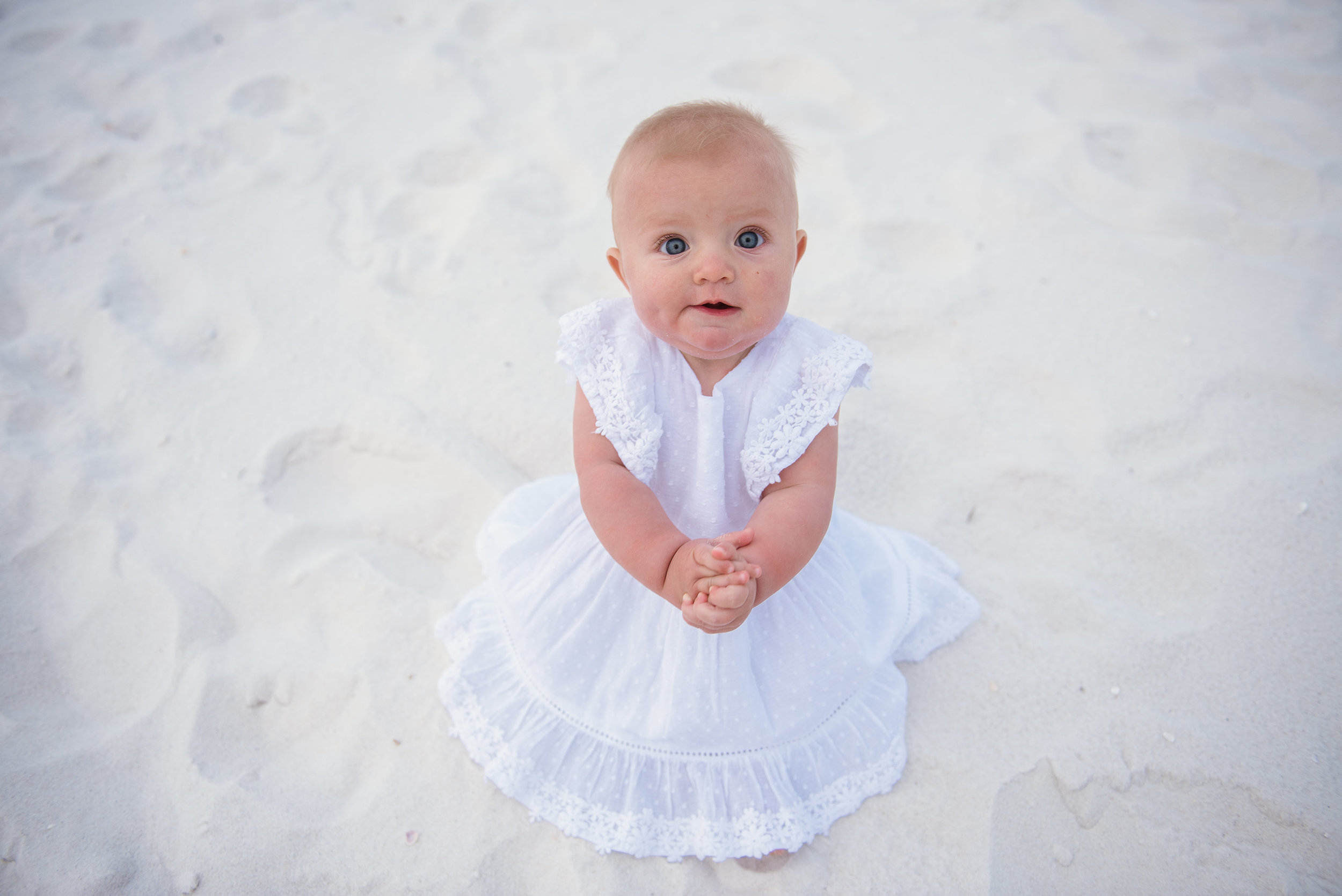 baby in sand-pensacola beach family photographer
