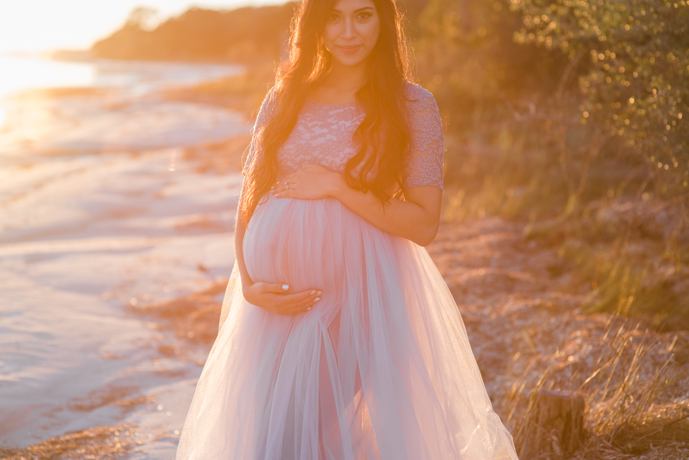 woman at shore-pensacola maternity photographer