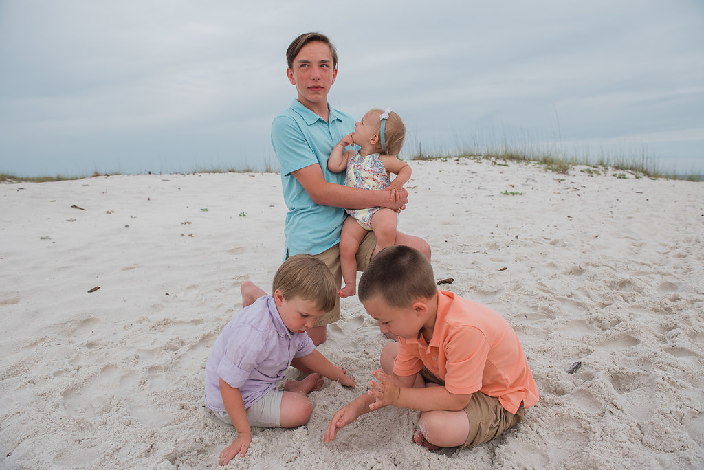 kids digging in sand-Pensacola Beach Family Photographer