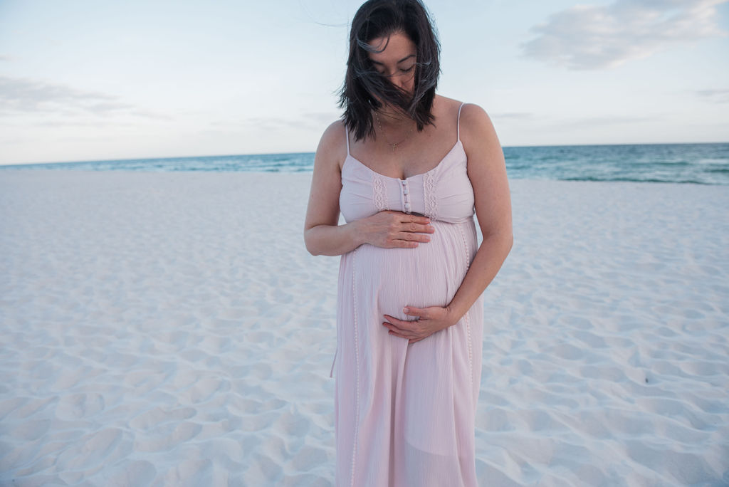 pregnant lady by ocean-pensacola family photographer