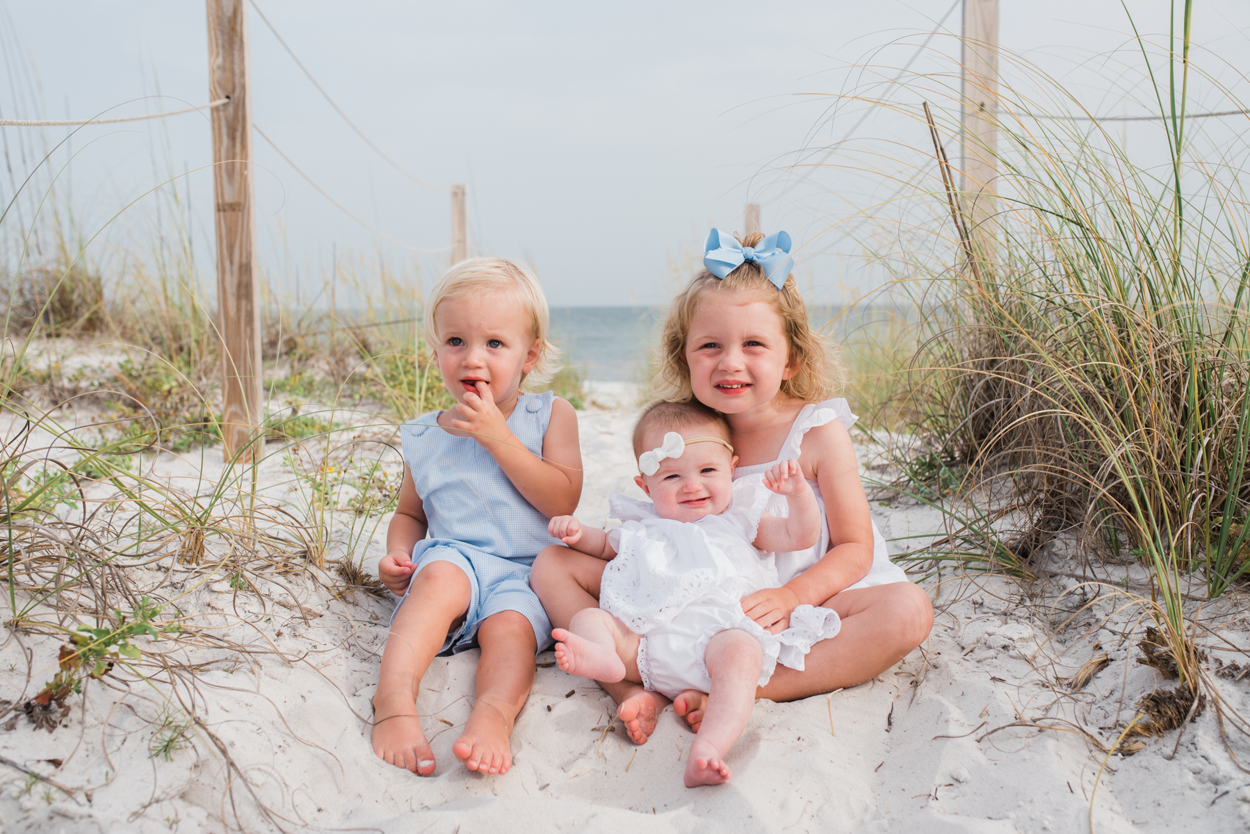 kids in sand-  Pensacola Beach family photographer