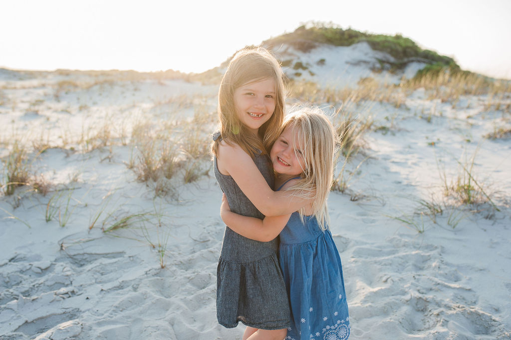 girls hugging at beach-Navarre Beach Photography