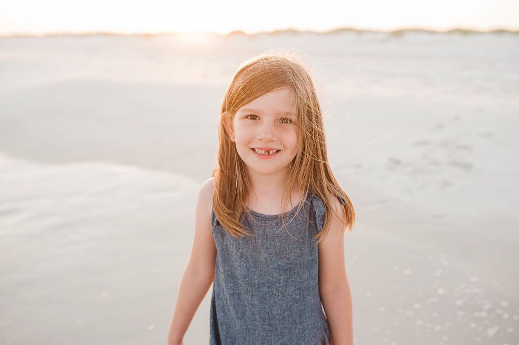 girl by dunes- Navarre Beach Photographer