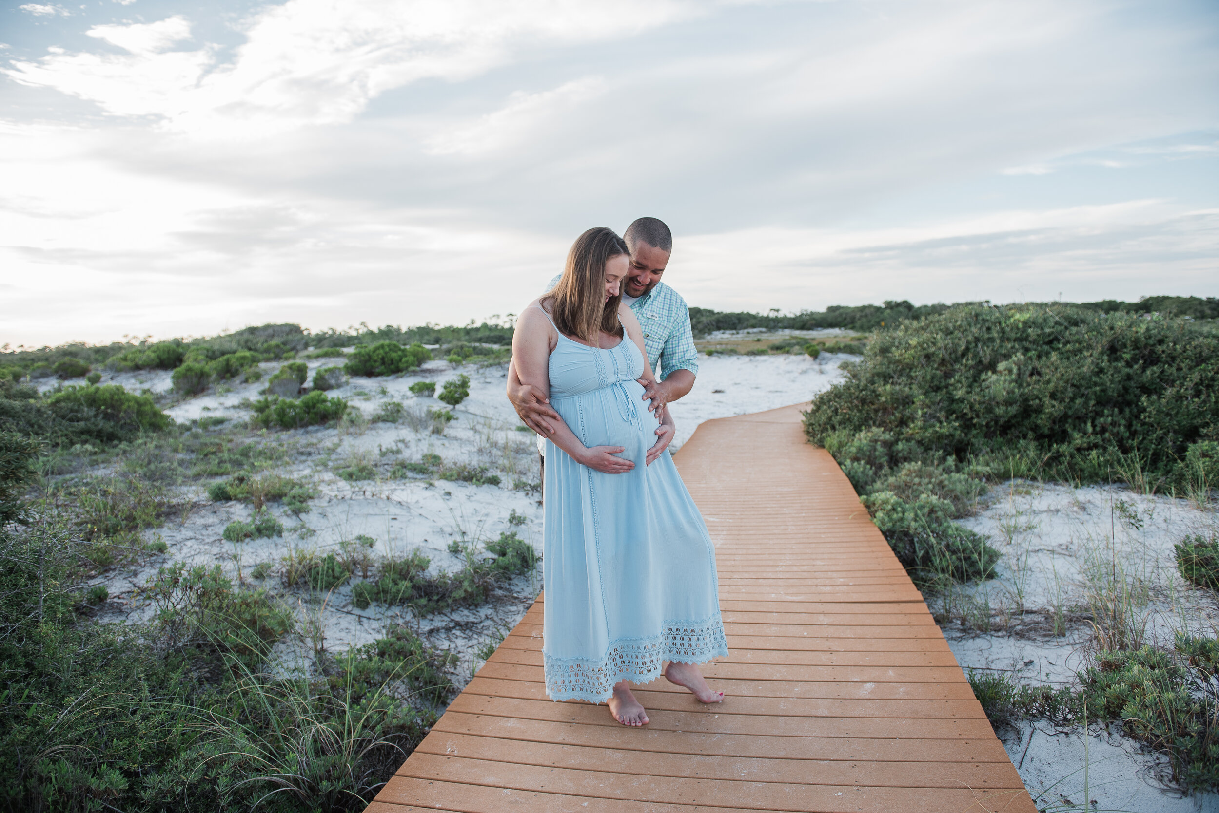 couple with maternity by beach-Pensacola family  maternity photographer-Ann Mangum Photography