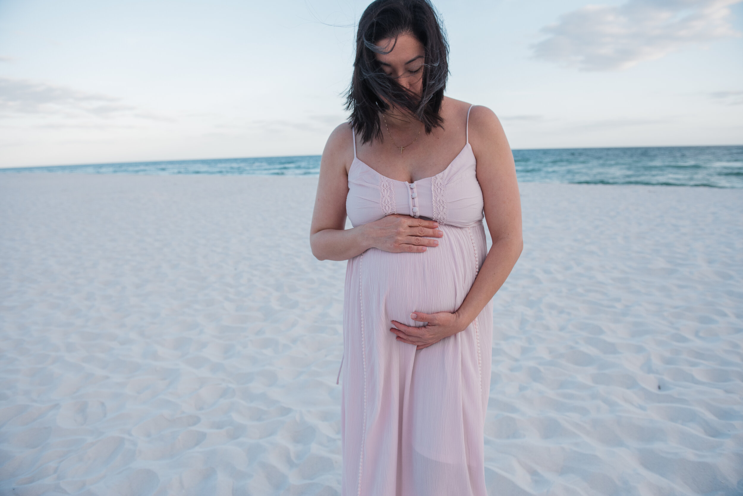 mom with hands on belly-Pensacola maternity photographer-Ann Mangum Photography