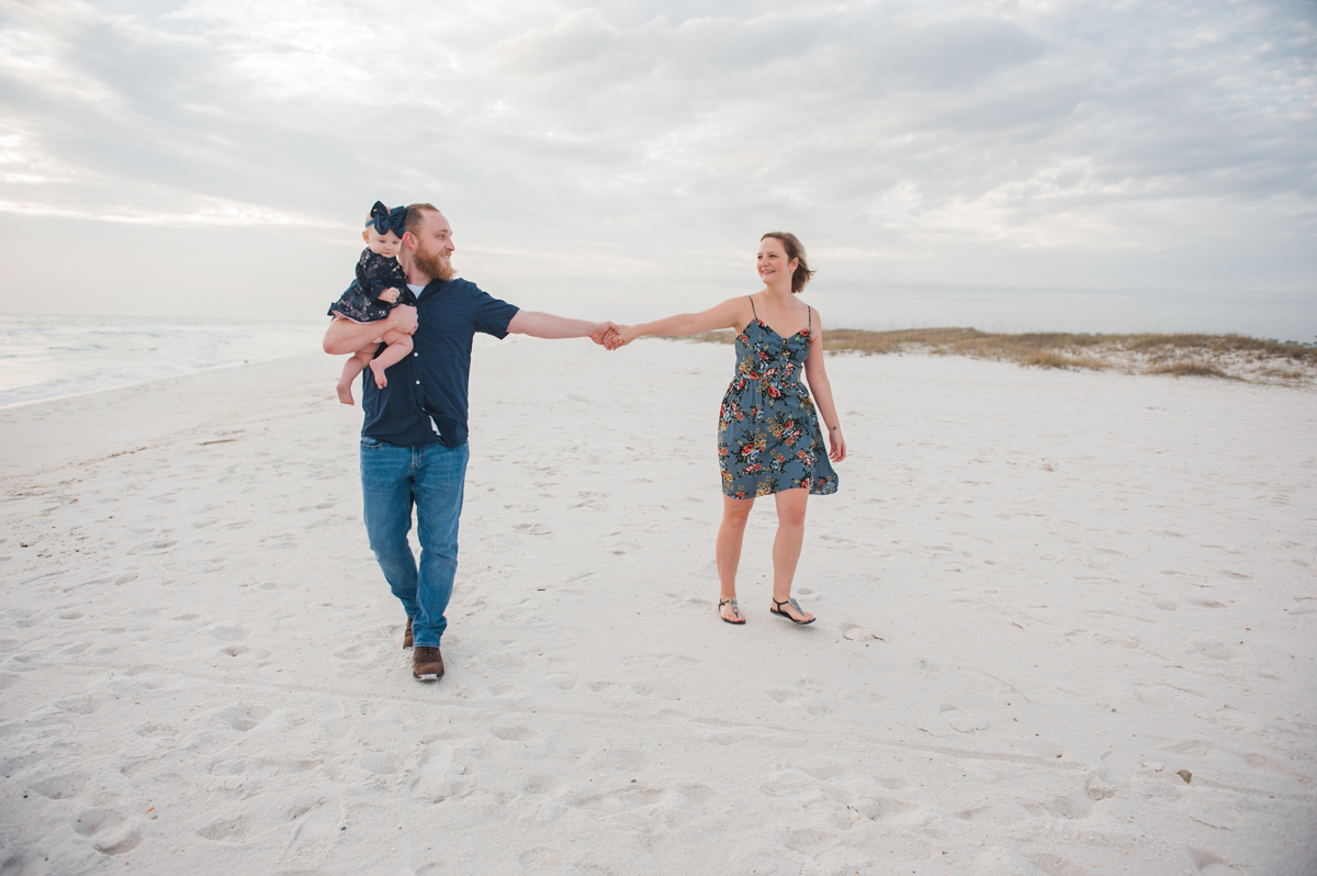 mom and dad with baby-pensacola family photographer