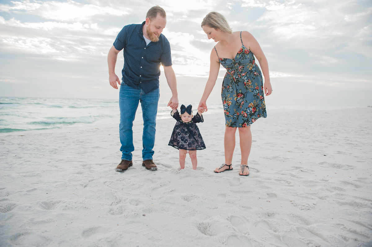 holding baby's hands-pensacola family photographer