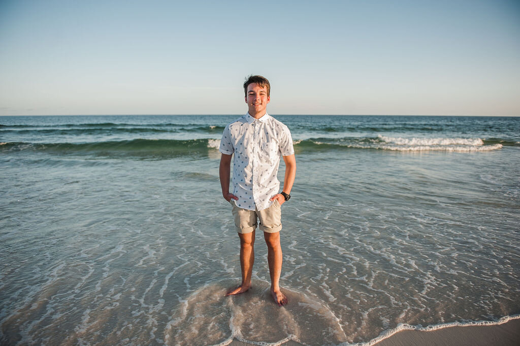 teen boy on beach-pensacola family photographer