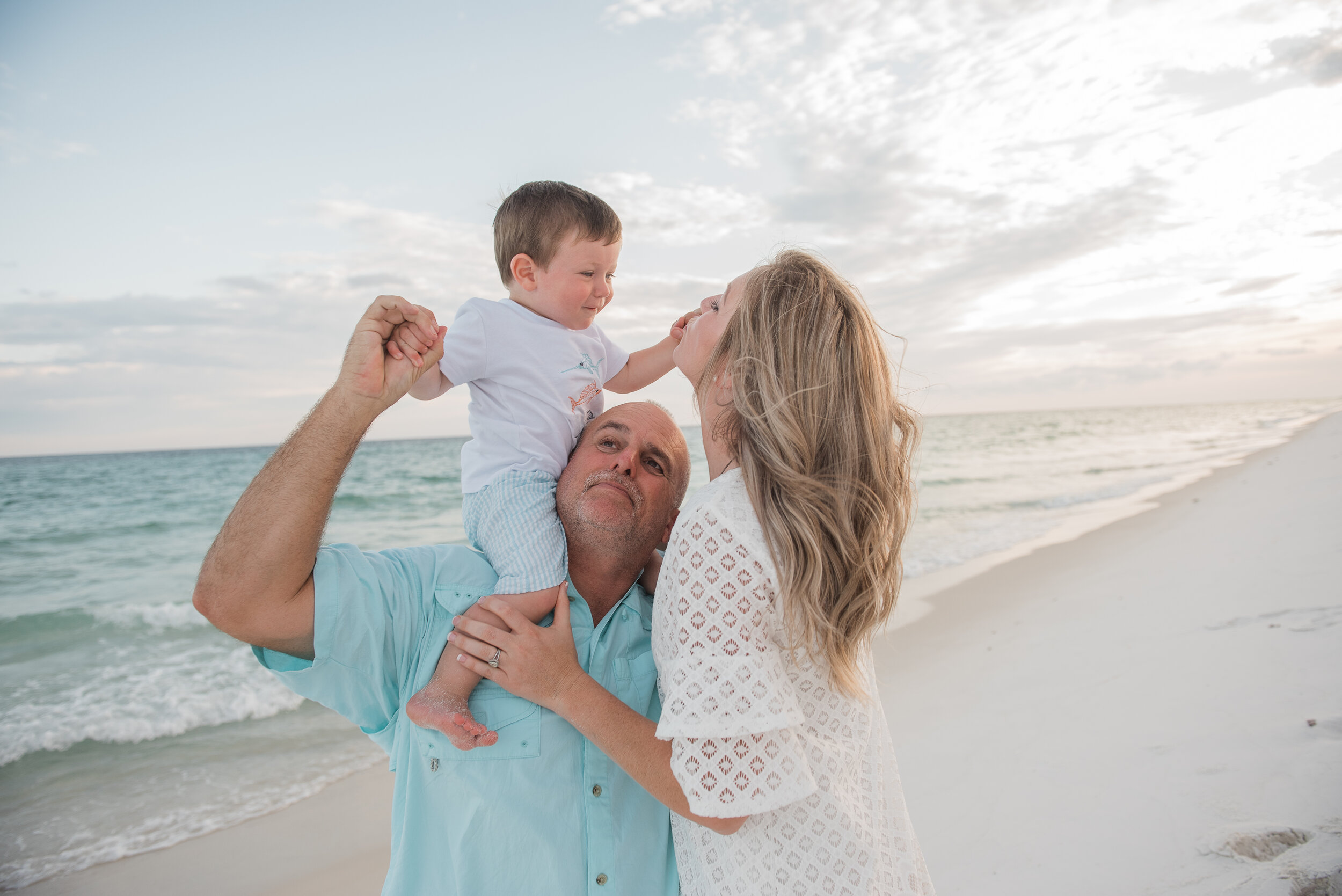 mom and dad with baby-pensacola beach photographer-Ann Mangum Photography