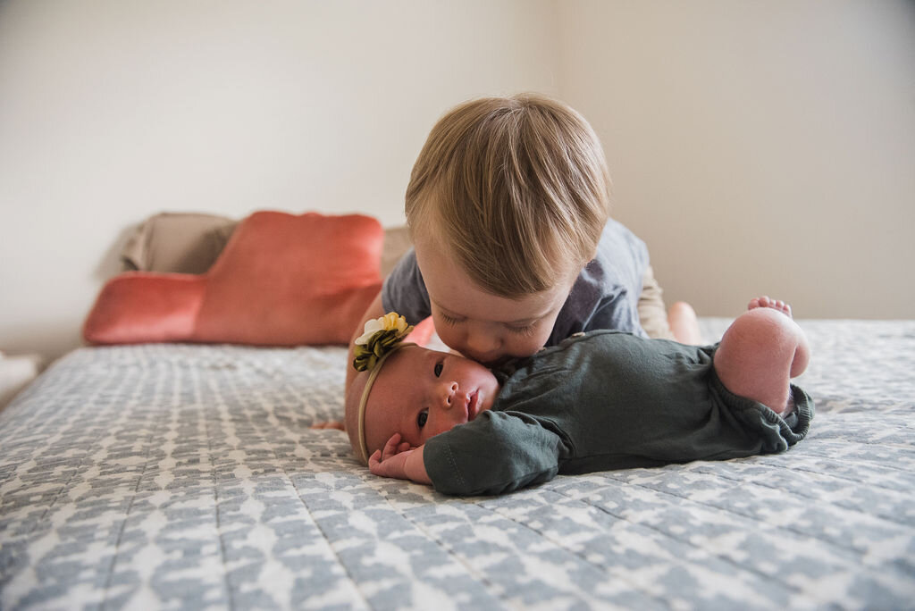 toddler kissing baby-pensacola newborn photographer-Ann Mangum Photography