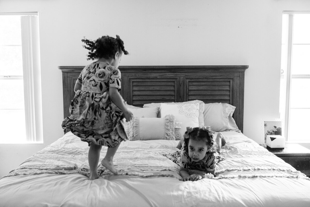 kids jumping on bed-pensacola newborn photographer