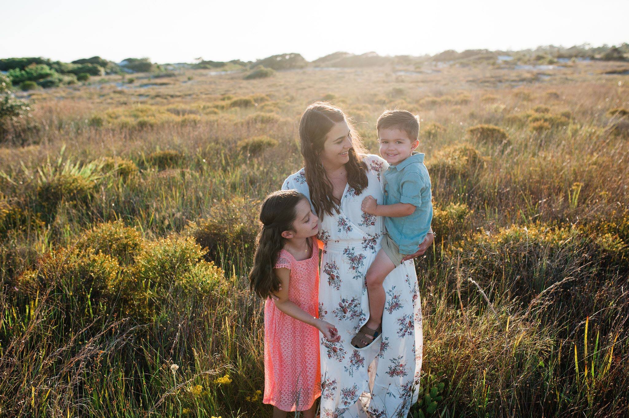 mom with two kids in dunes-pensacola beach photographer-Ann Mangum Photography
