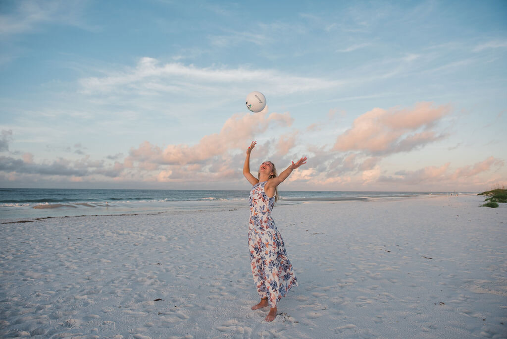 beach volleyball girl in dress-pensacola beach family photographer