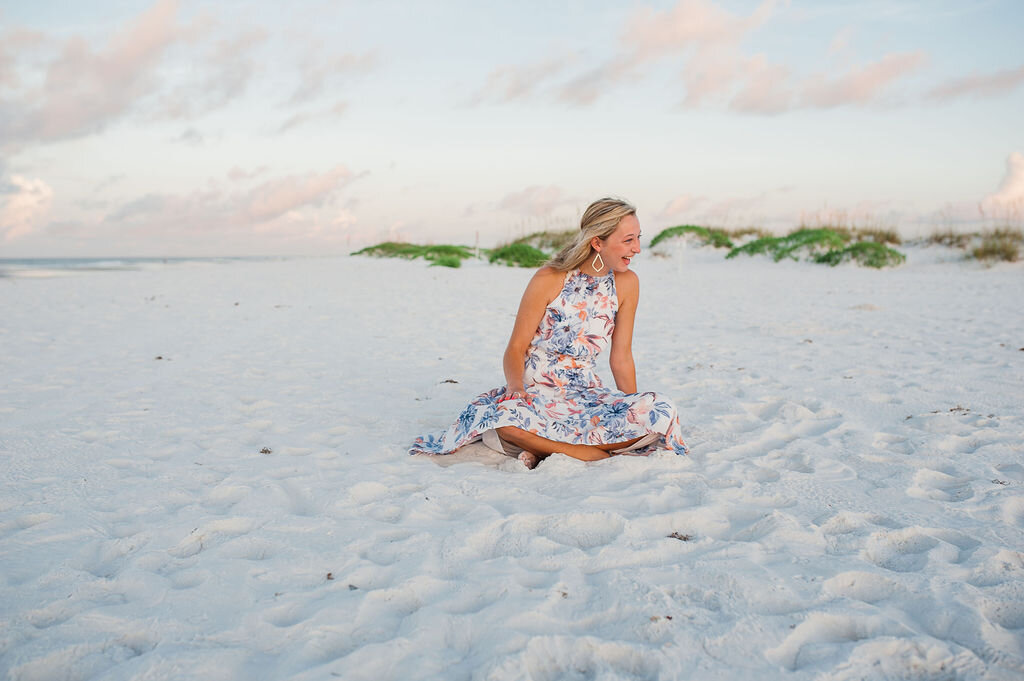girl sitting on beach-pensacola beach photographer