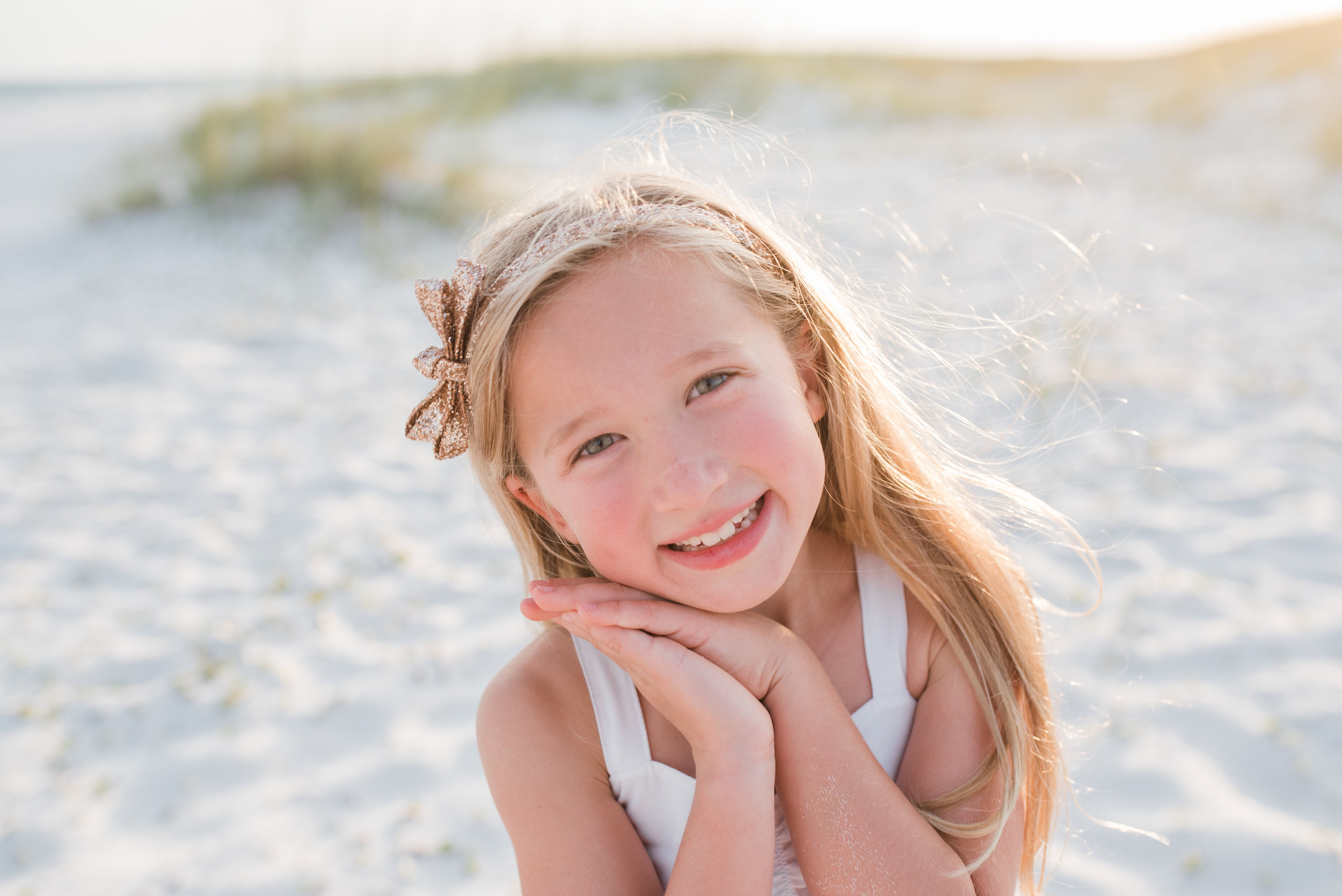 girl with hand by face-pensacola family photographer