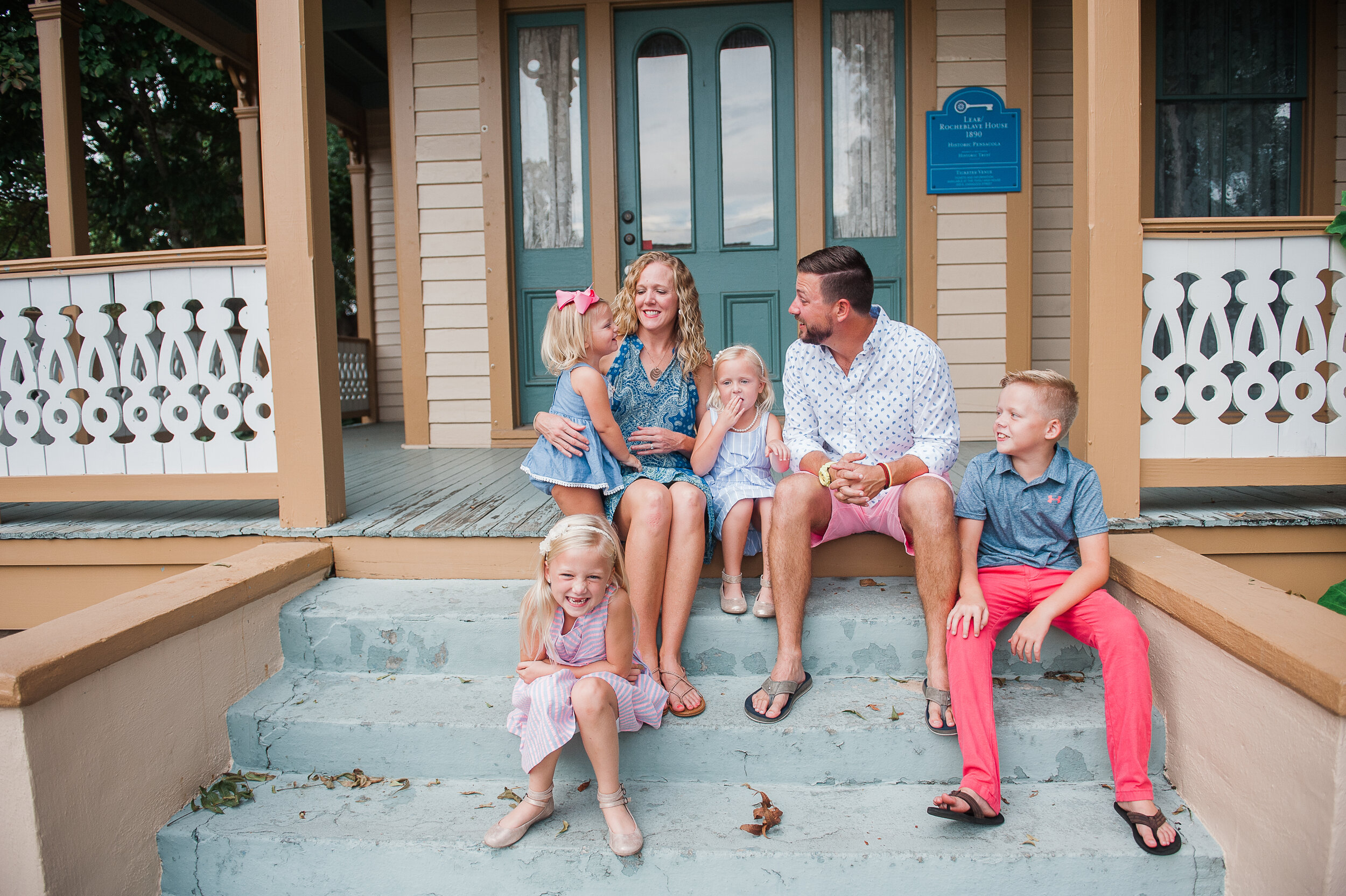 family on porch-pensacola family photographer