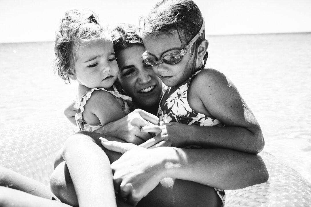 girls on float-Pensacola-Beach-Ann Mangum Photography