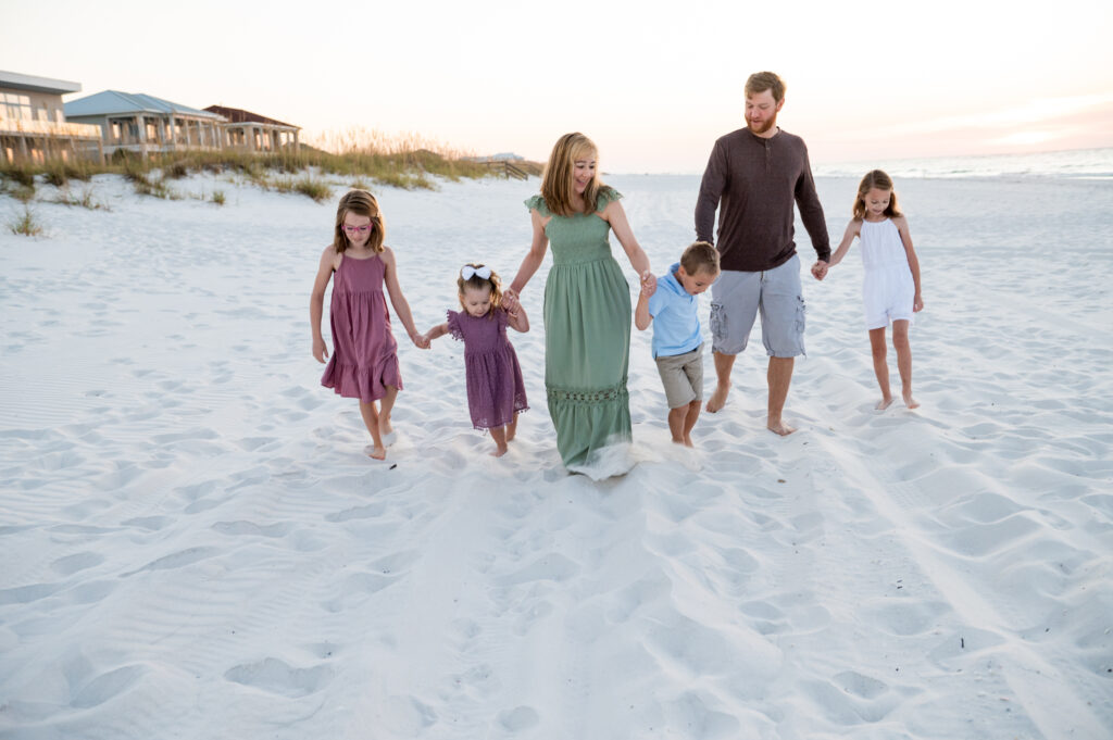 family walking at Pensacola Beach