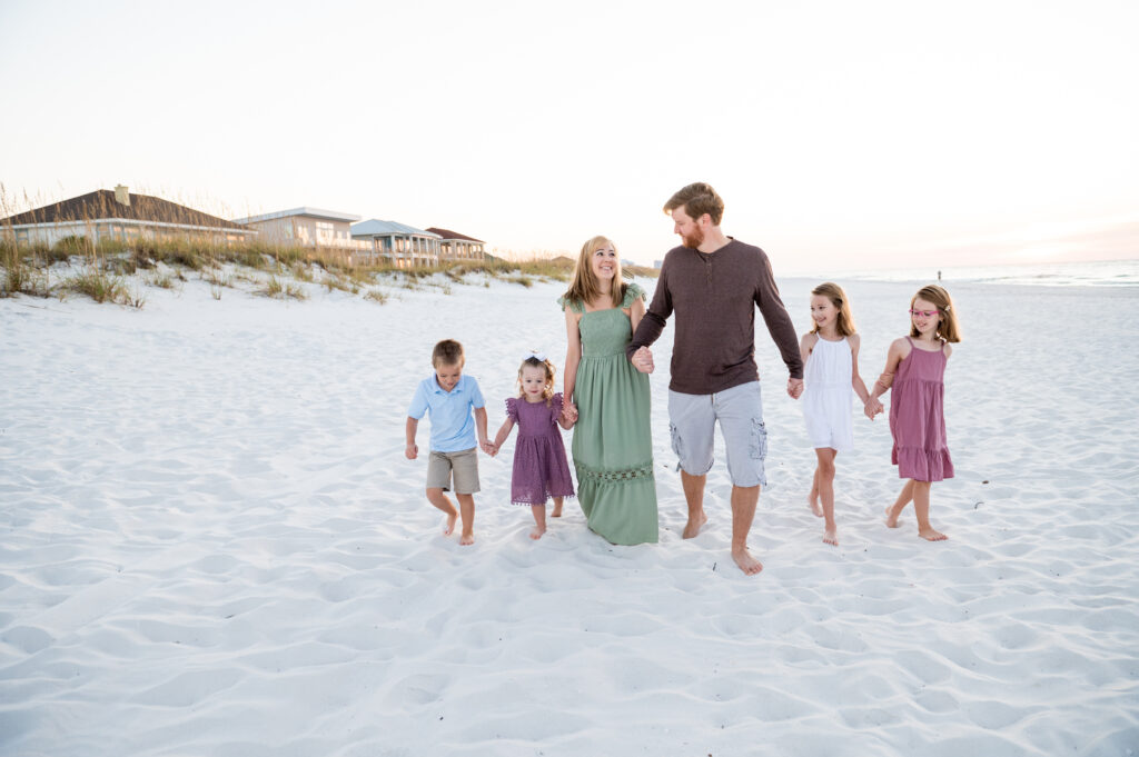 Family walking on beach-pensacola Beach photographer