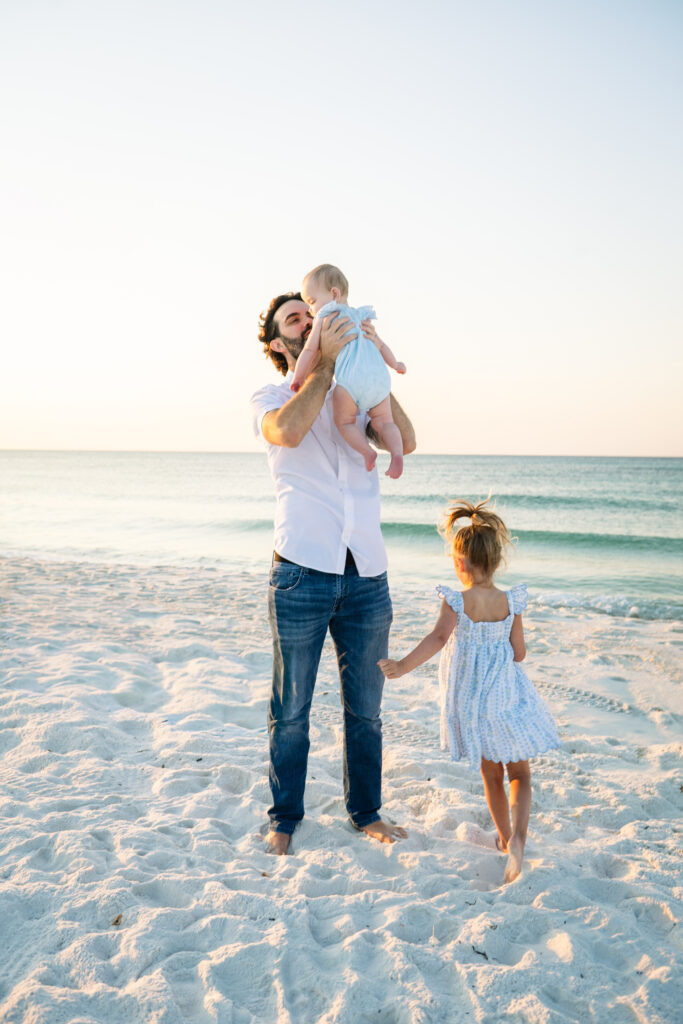 dad with kids at Pensacola beach