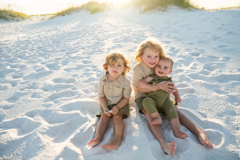 boys hugging on pensacola beach
